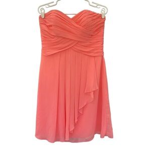 David’s Bridal bridesmaid dress. Beautiful chiffon like peachy coral cross chest